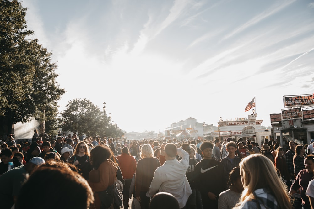 people gathering on a concert during daytime