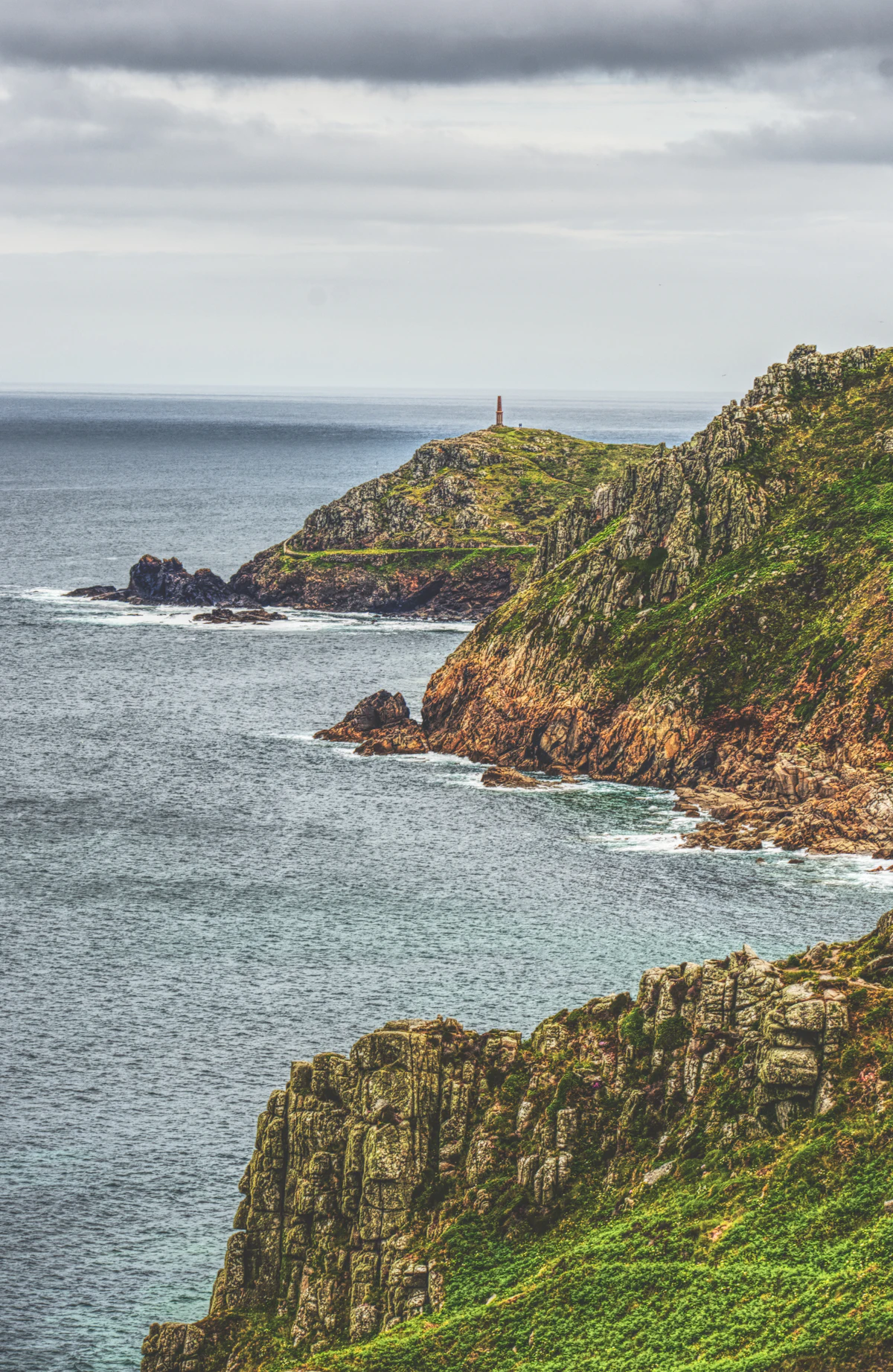 Cape Cornwall and the chimney on its summit, seen from the granite cliffs to the south