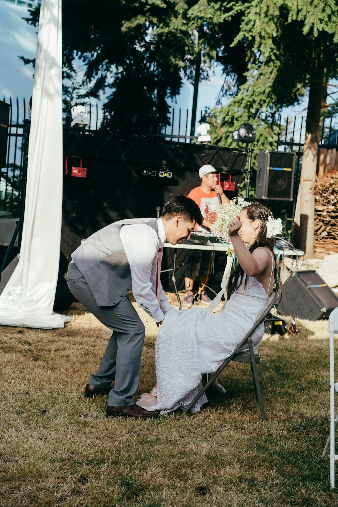 man and woman kissing on the ground