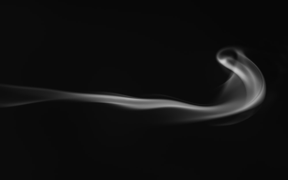 white smoke on black background