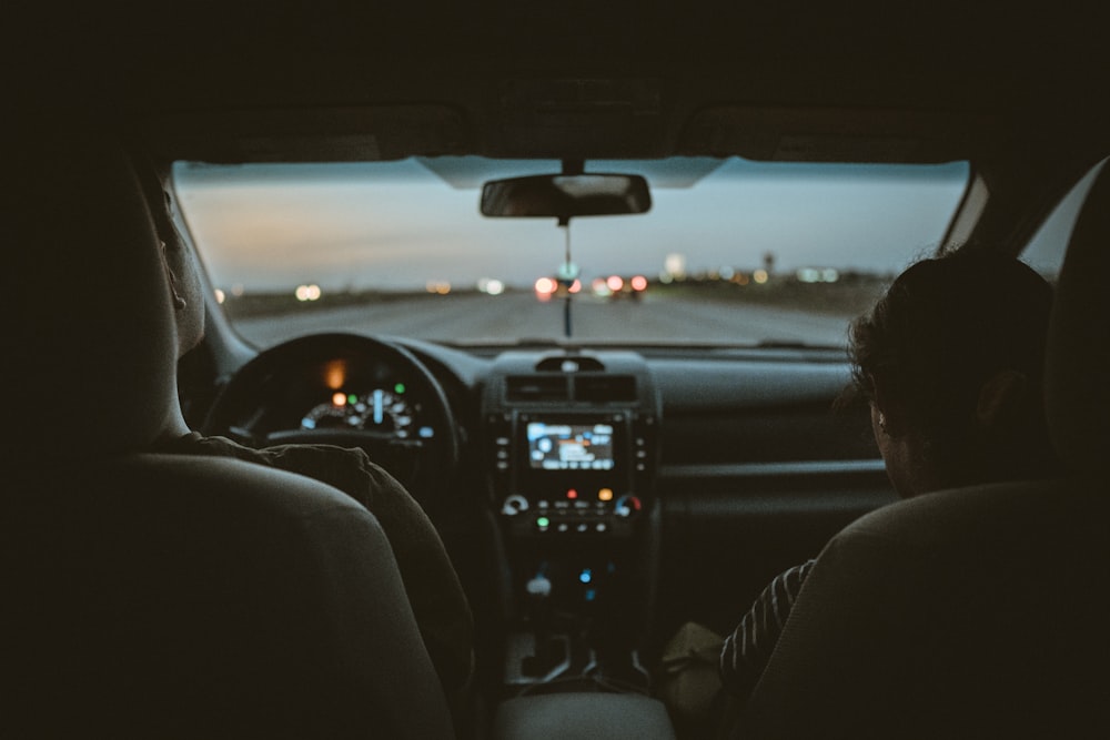 person driving car during night time