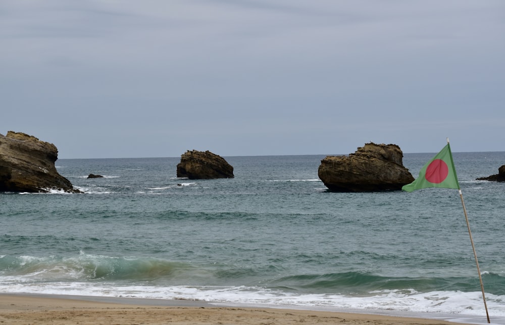 brown rock formation on sea during daytime