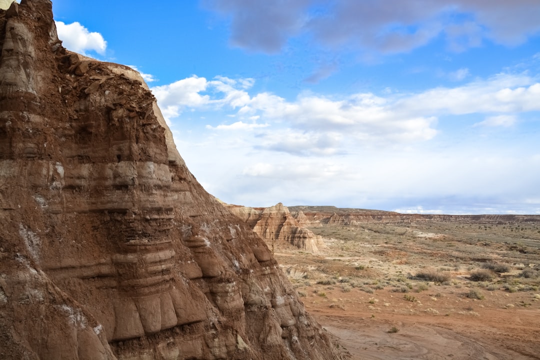 brown rock formation under blue sky during daytime