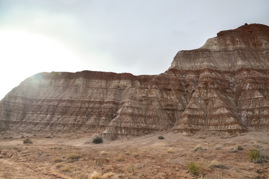 brown rocky mountain under white sky during daytime