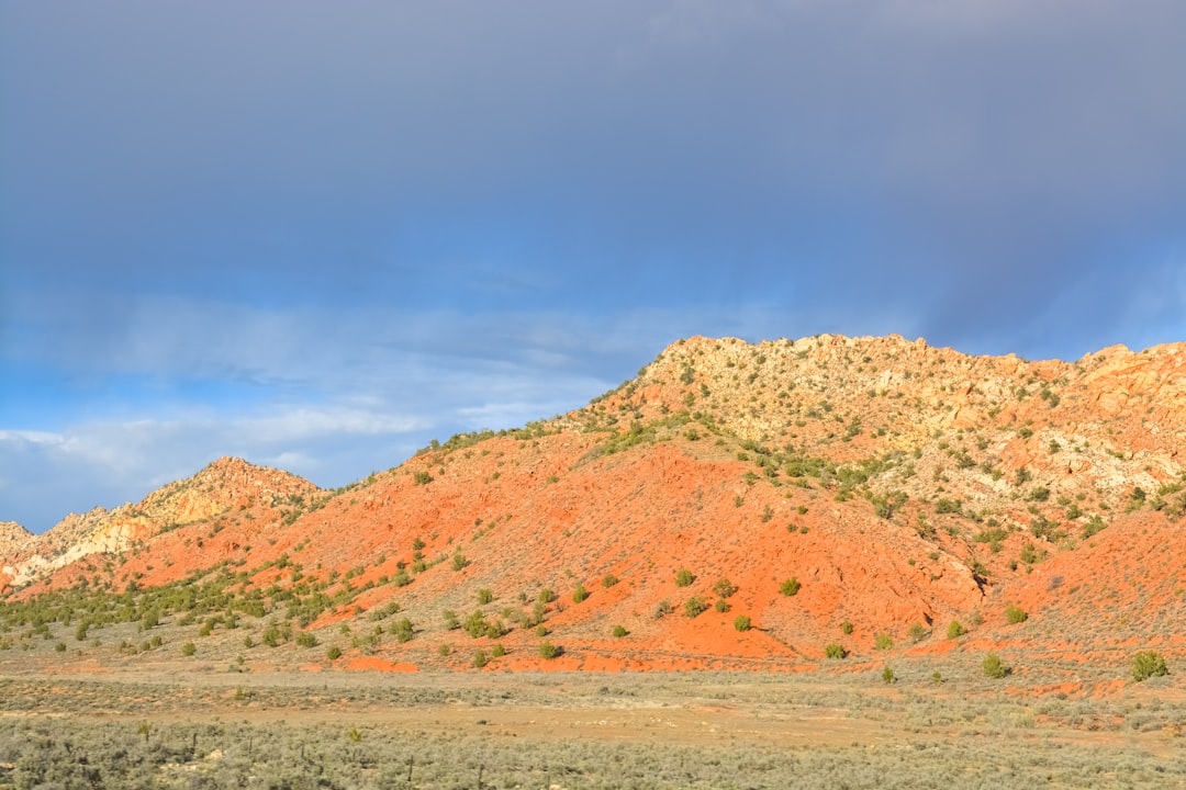 brown mountain under blue sky during daytime
