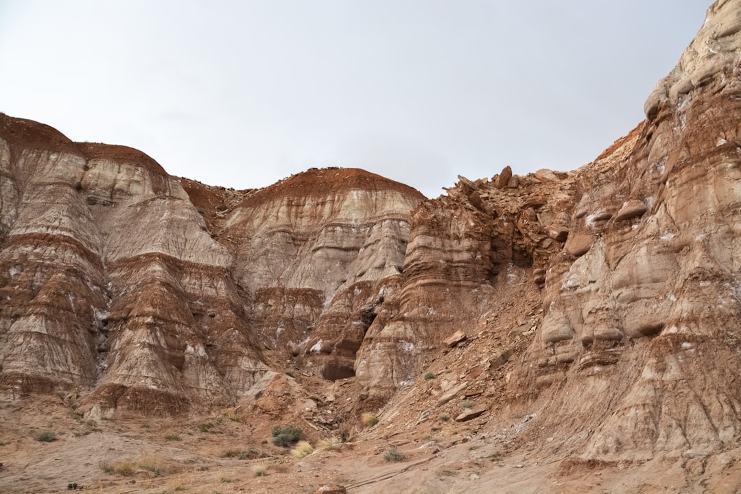 brown rocky mountain under white sky during daytime