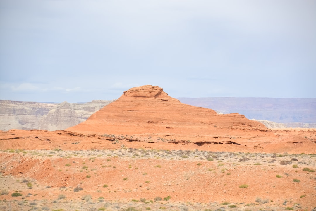 brown mountain under white sky during daytime