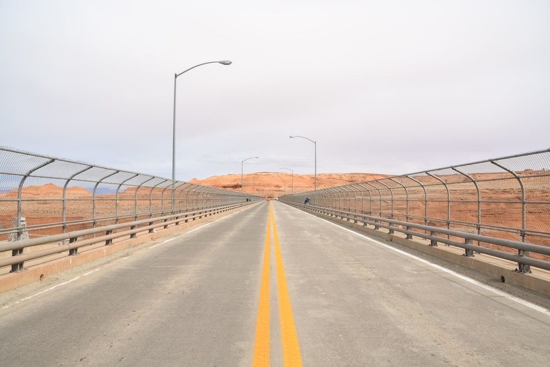 gray concrete road under gray sky