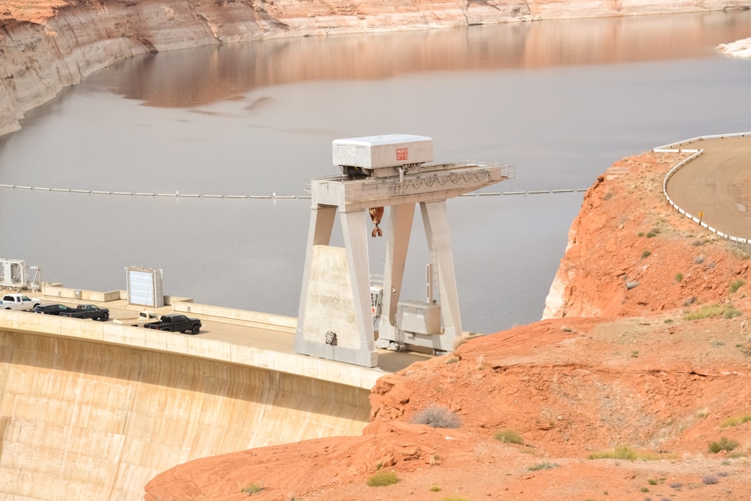 white and brown concrete bridge over river