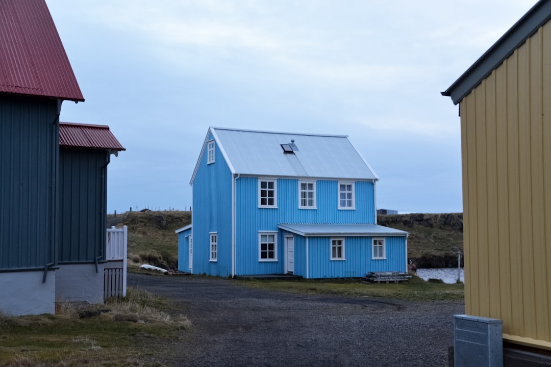 blue and white wooden house under blue sky during daytime