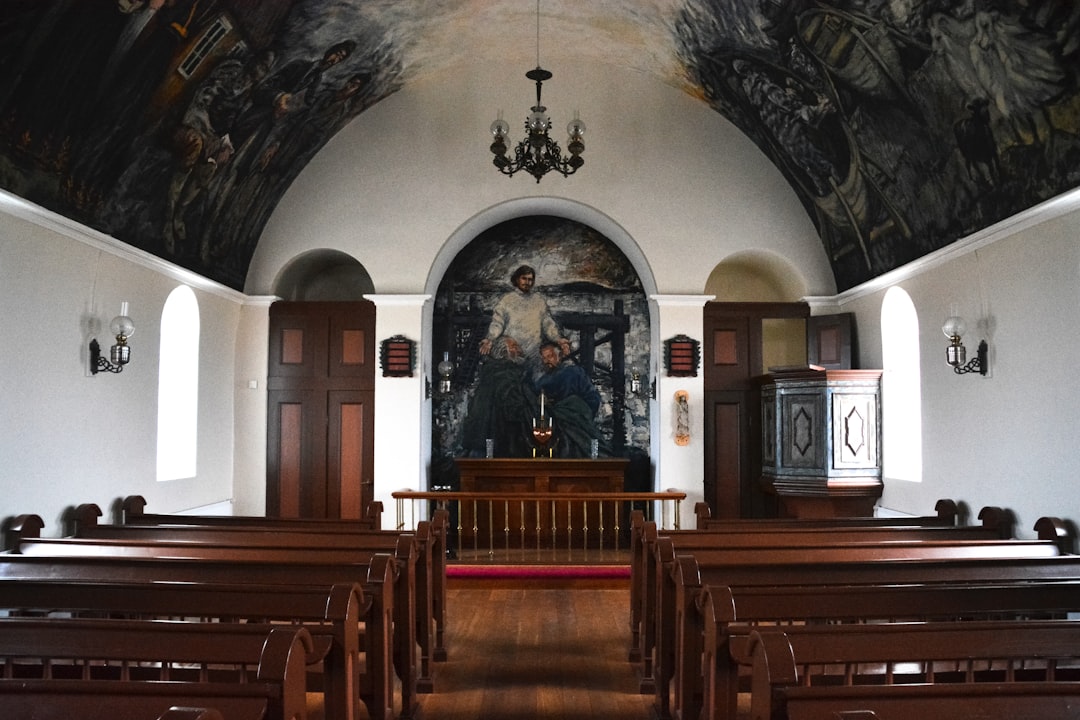 brown wooden bench inside church