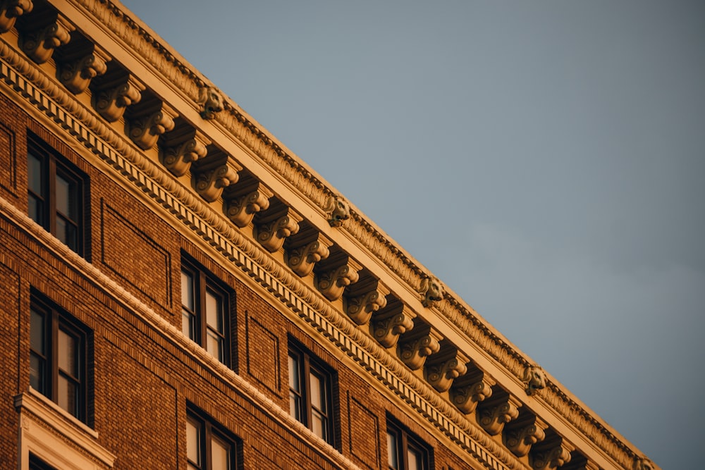 brown concrete building under blue sky during daytime