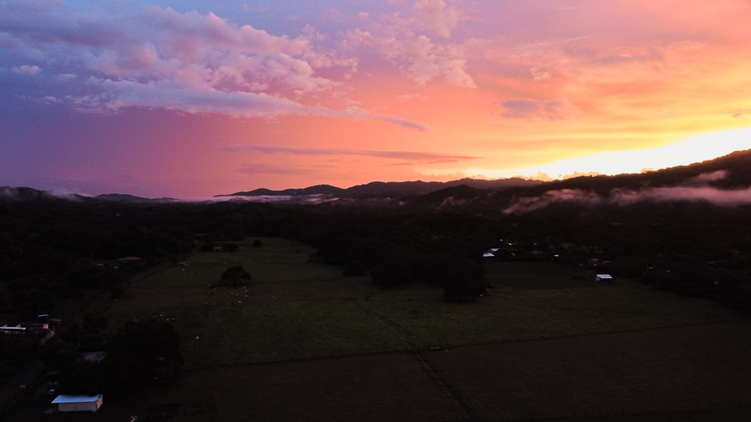 silhouette of mountain during sunset