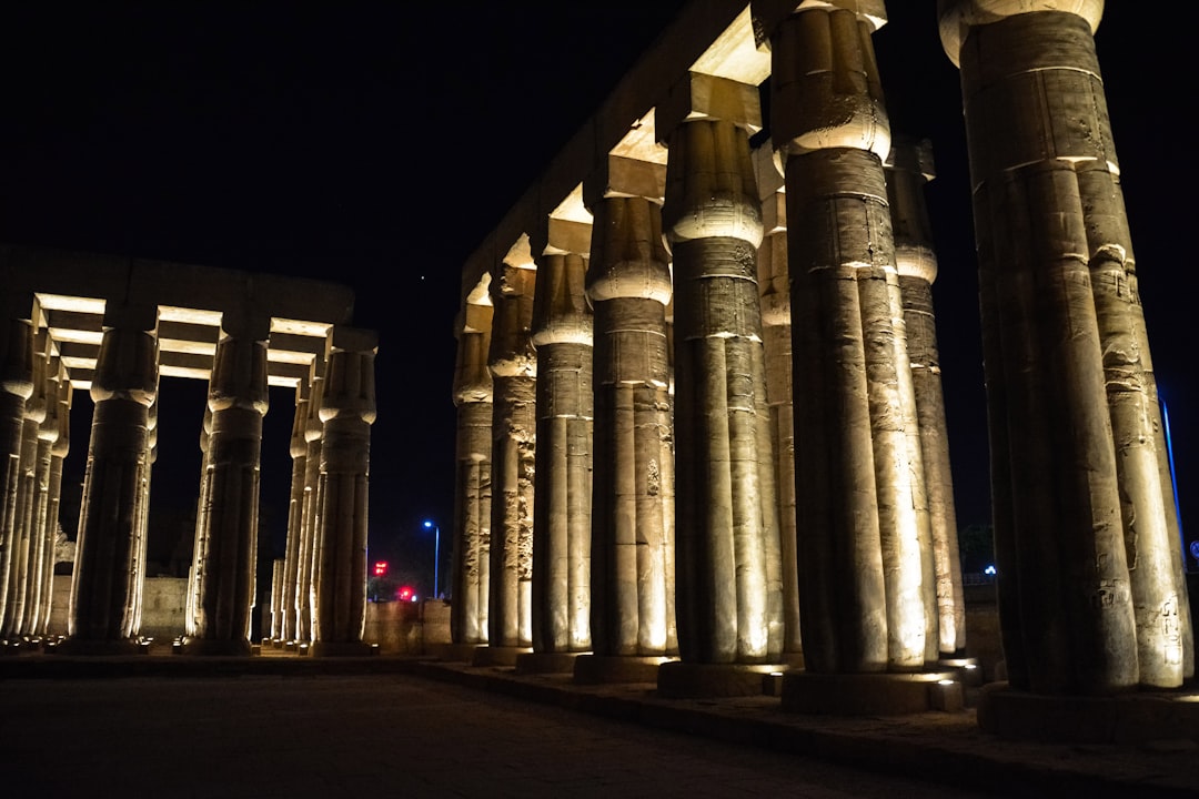 brown concrete pillars during night time
