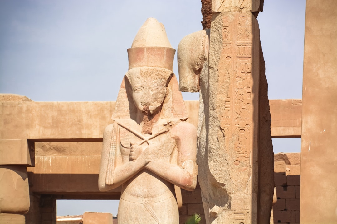 brown concrete statue during daytime