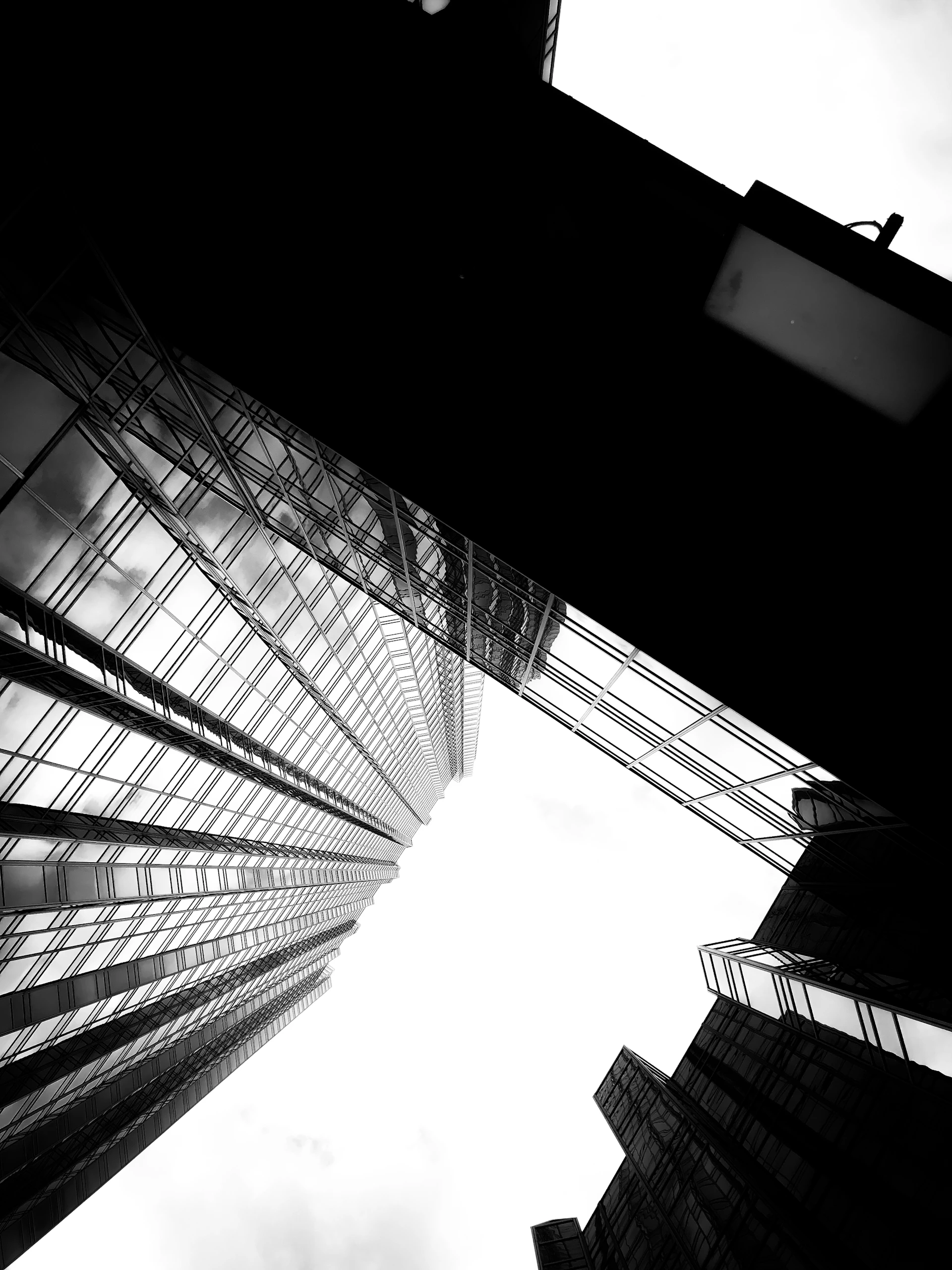 woman wearing yellow long-sleeved dress under white clouds and blue sky during daytime