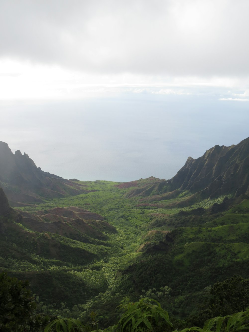 green mountains under white sky during daytime