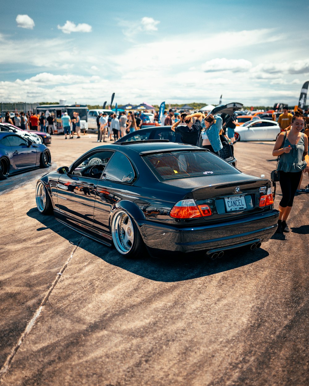 black bmw m 3 on road during daytime