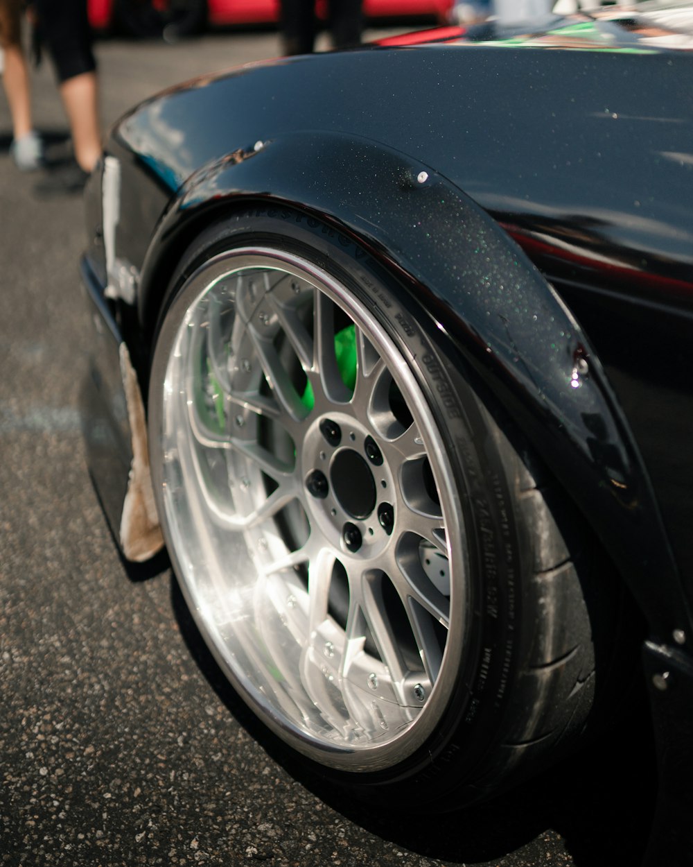 black car with gray wheel