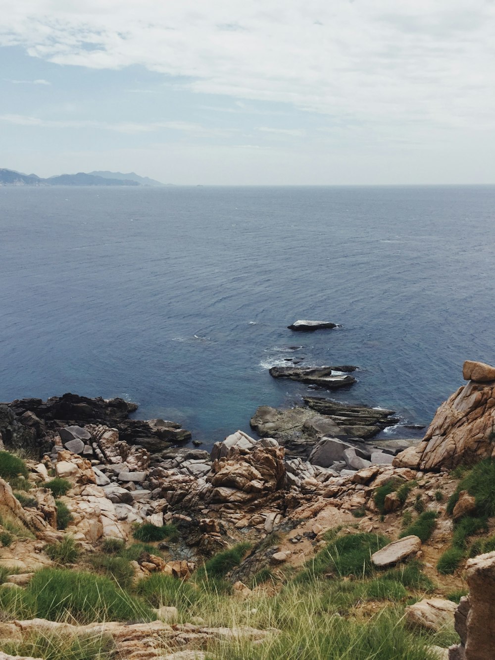 white and black boat on sea during daytime