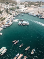 aerial view of boats on sea during daytime