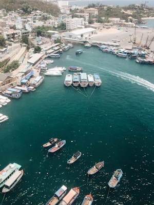aerial view of boats on sea during daytime