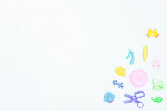 Colorful sensory toys arranged on a vibrant multicolored background.