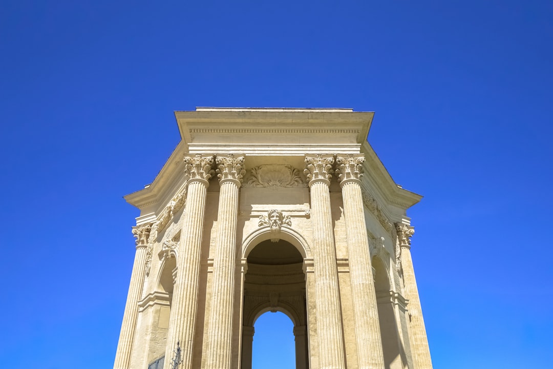 white concrete building under blue sky during daytime