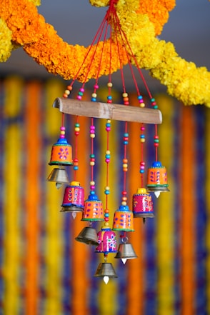 brown wooden hanging decor with yellow and red hanging decors