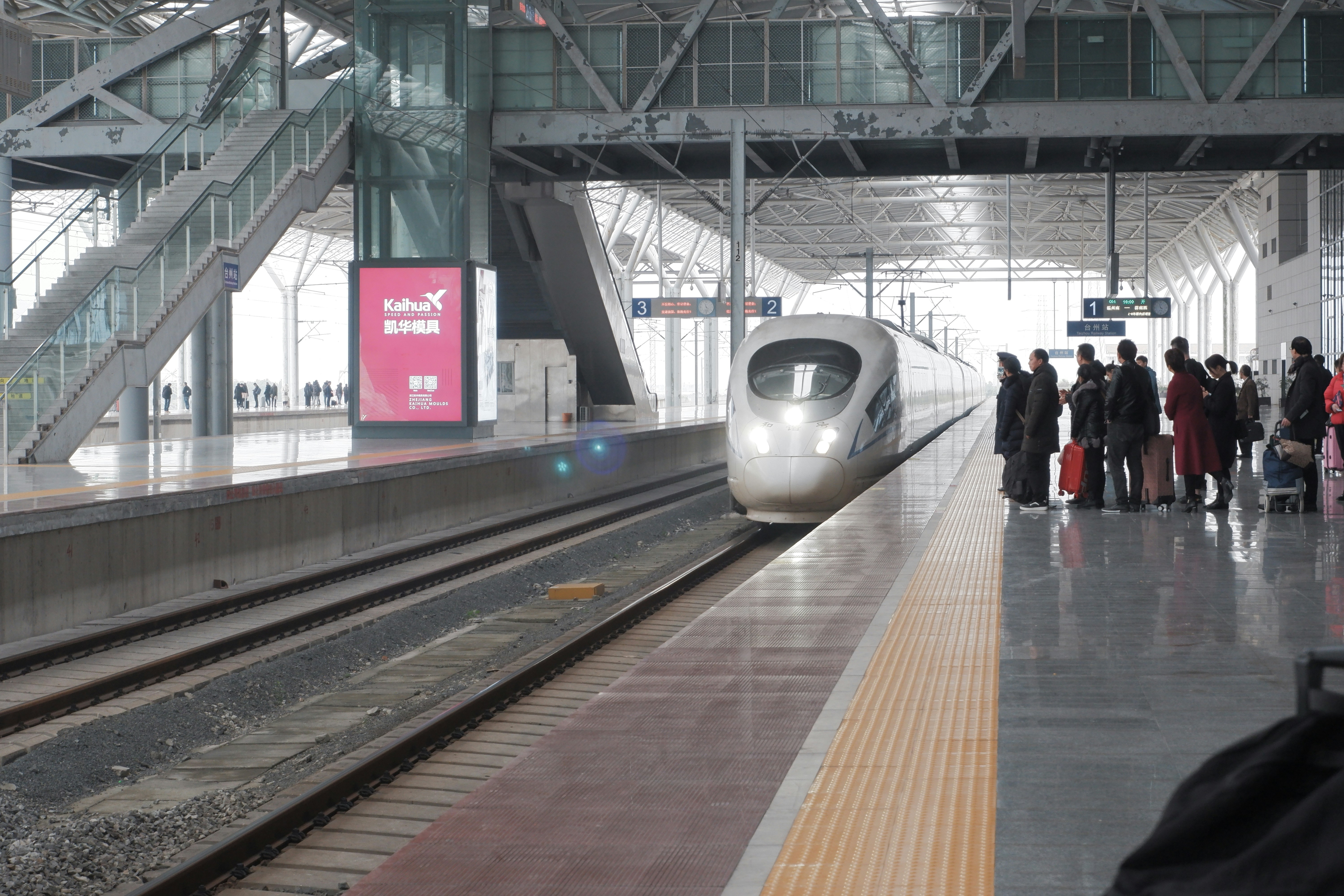 people walking on train station during daytime