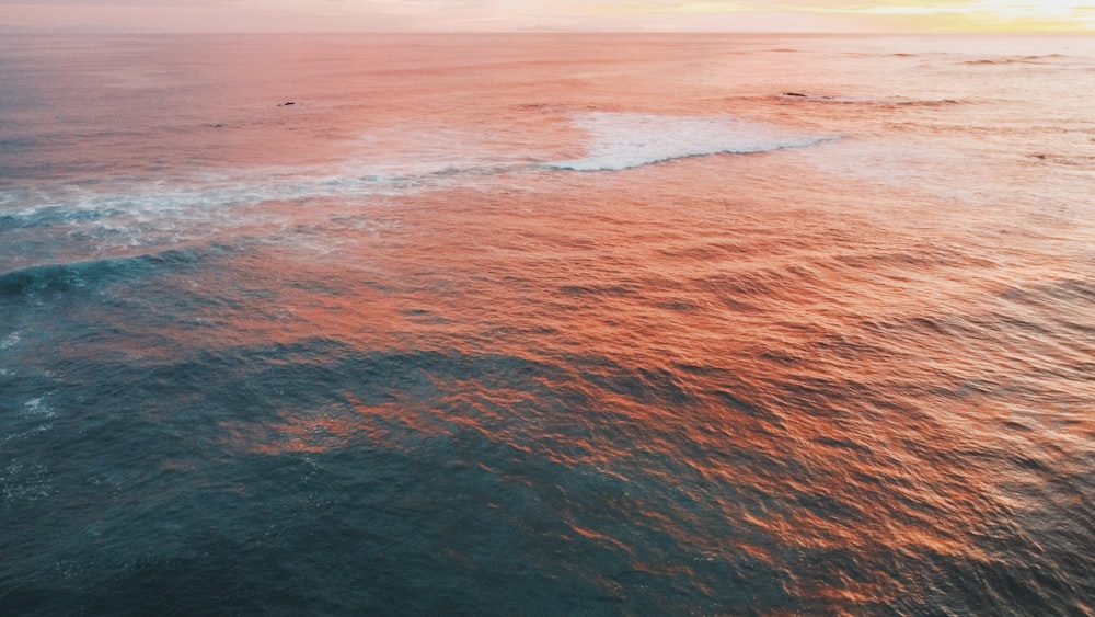 blue sea under blue sky during daytime