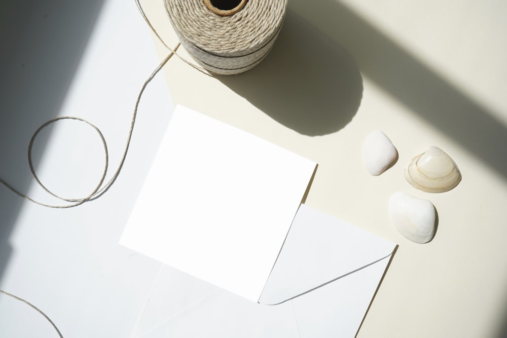 white printer paper on white table