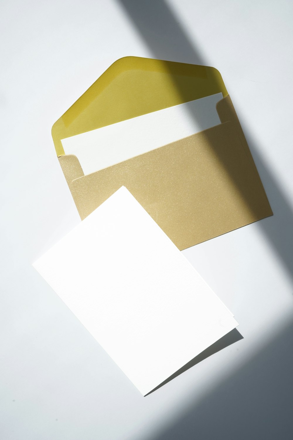 white printer paper on brown folder
