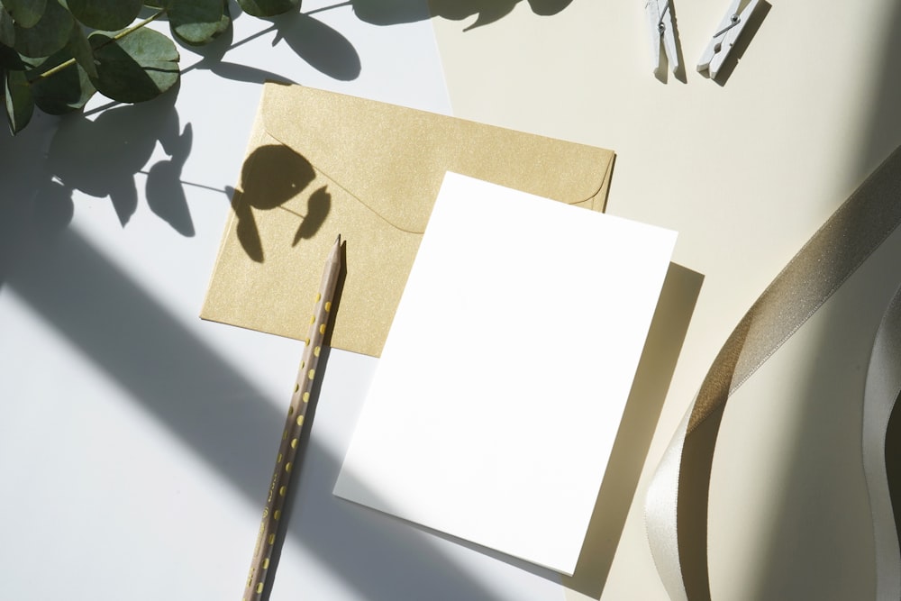 white printer paper on brown wooden table