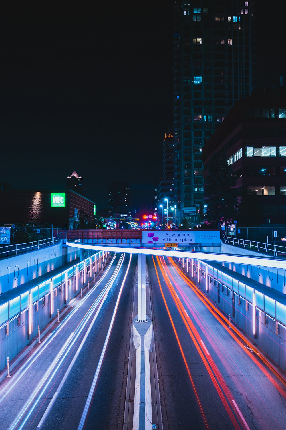 time lapse photography of cars on road during night time