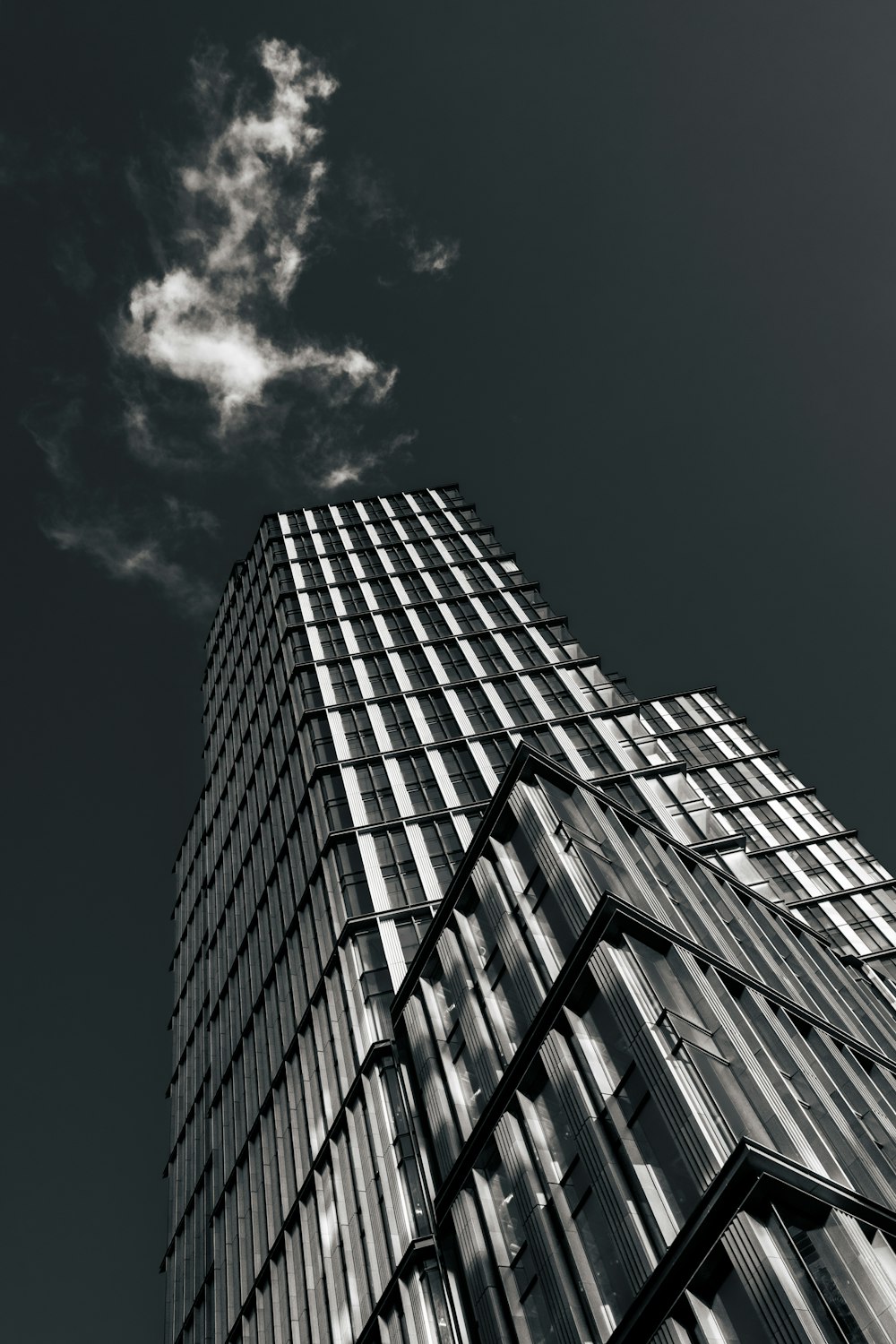 grayscale photo of high rise building