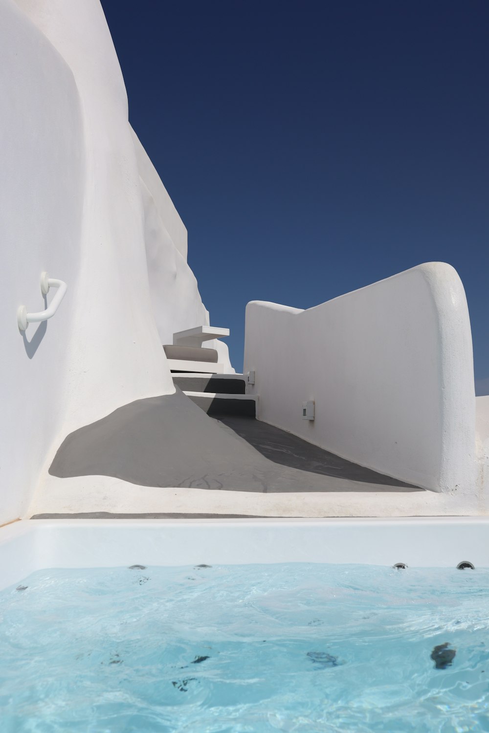 white concrete building under blue sky during daytime