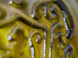Close-up of a polished glass edge detail showing craftsmanship and quality finish.
