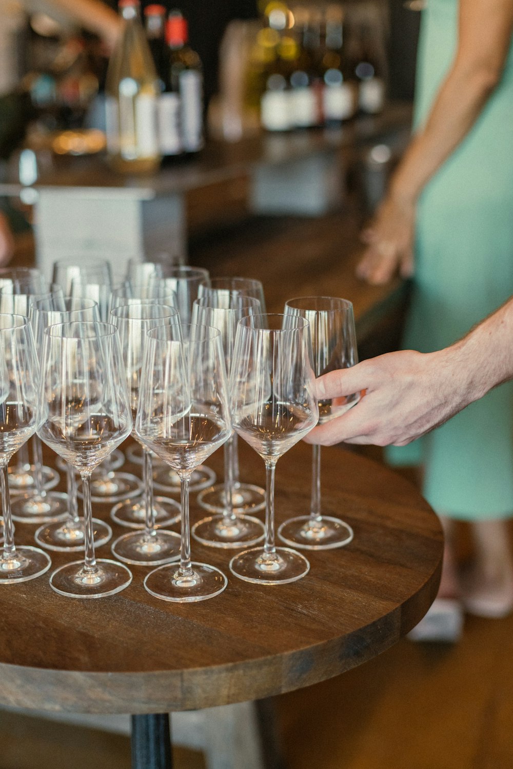 clear wine glasses on brown wooden table