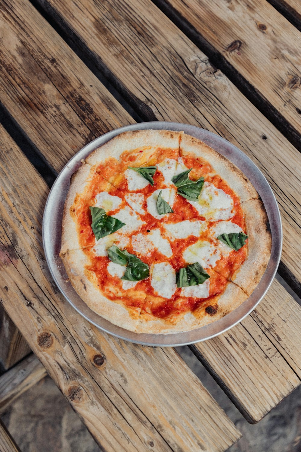 pizza on brown wooden table