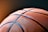 brown and black basketball ball