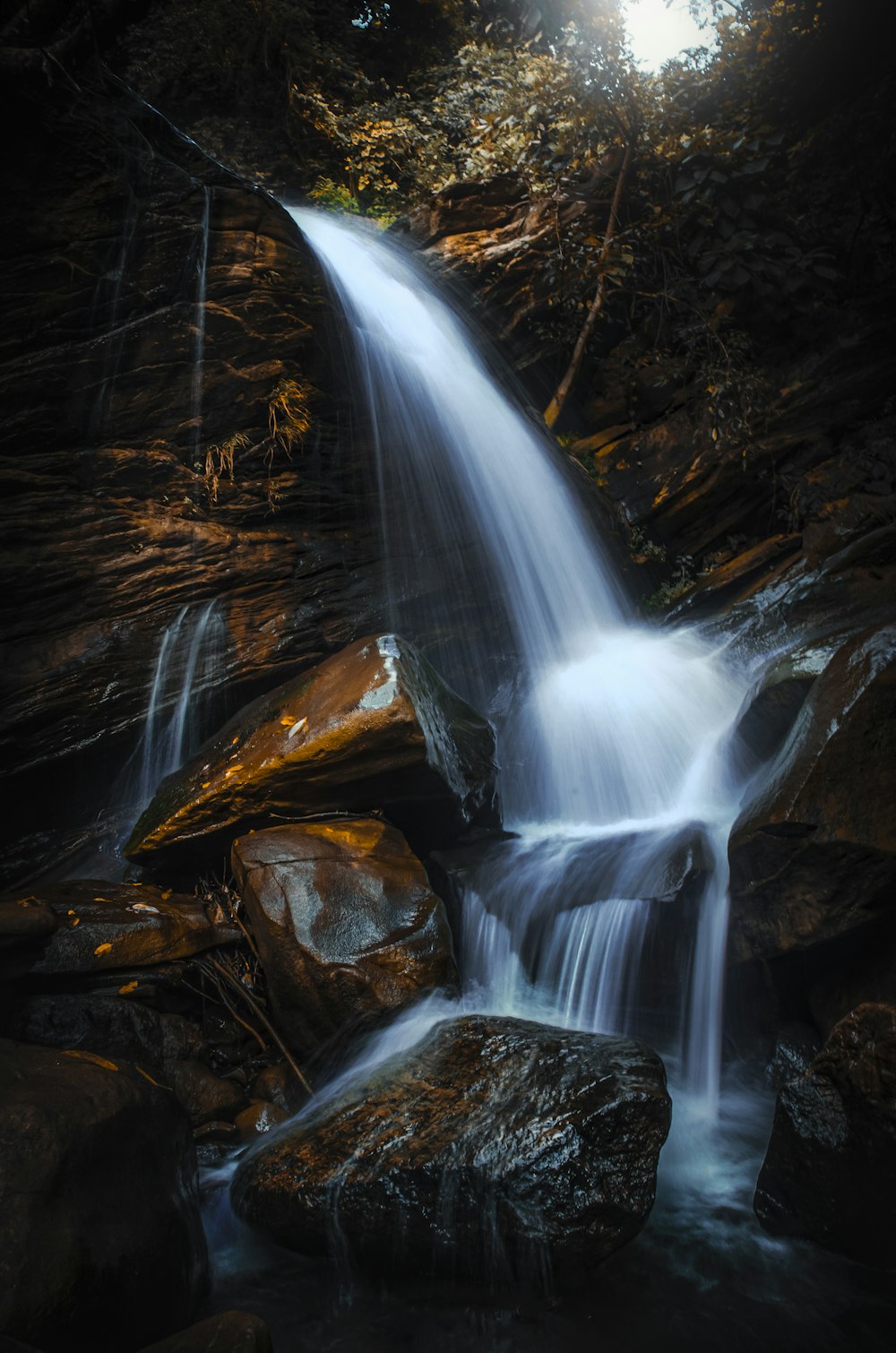 time lapse photography of water falls