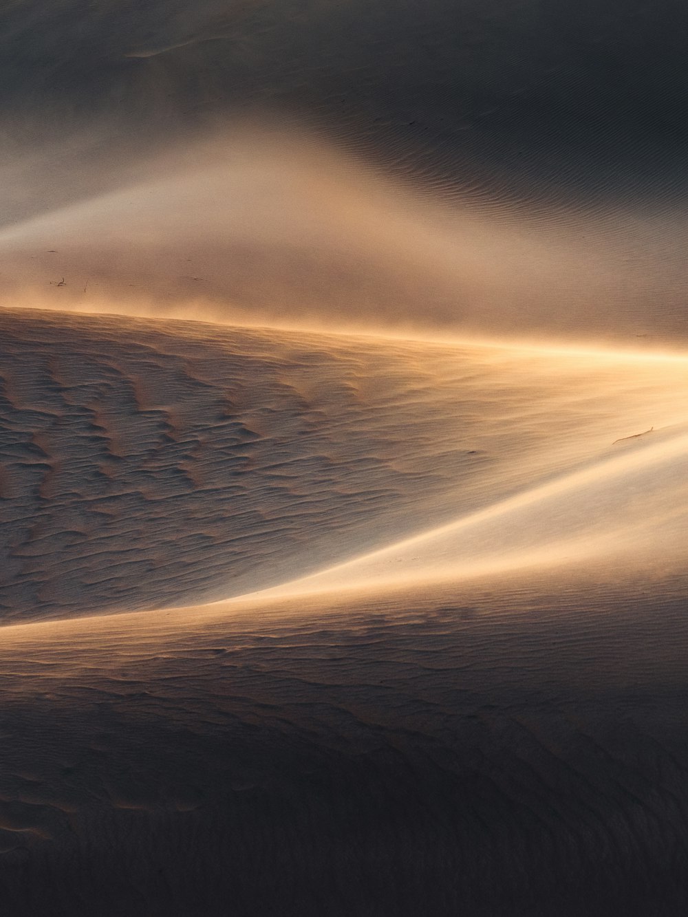 white sand with water during daytime