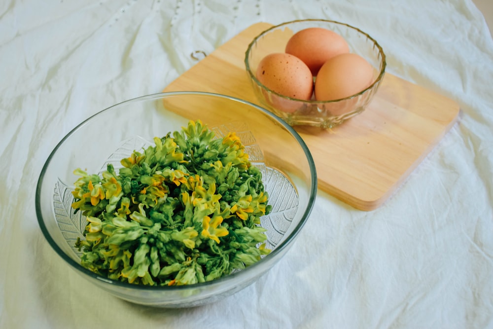 green vegetable on clear glass bowl