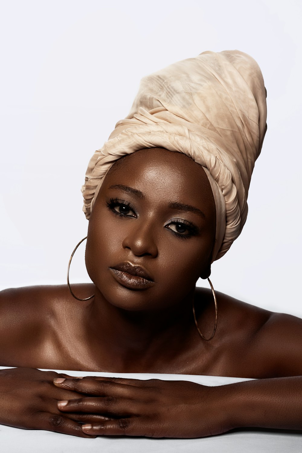 woman with white textile on head