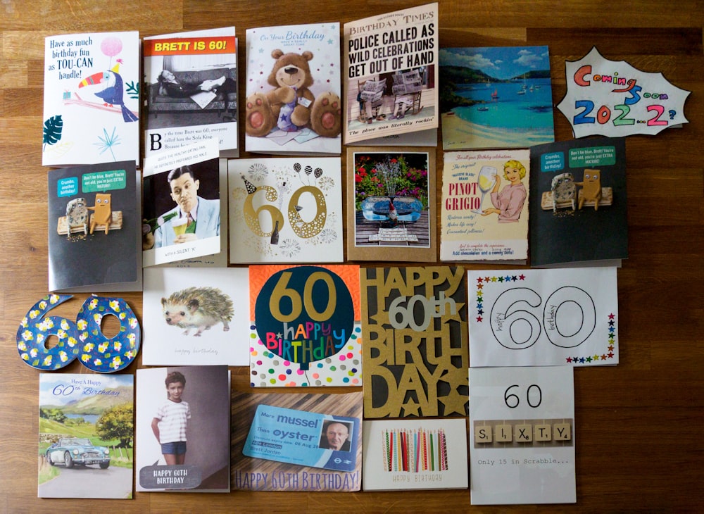 assorted magazines on brown wooden table