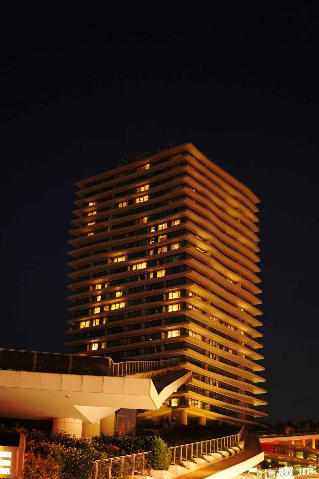 brown high rise building during night time