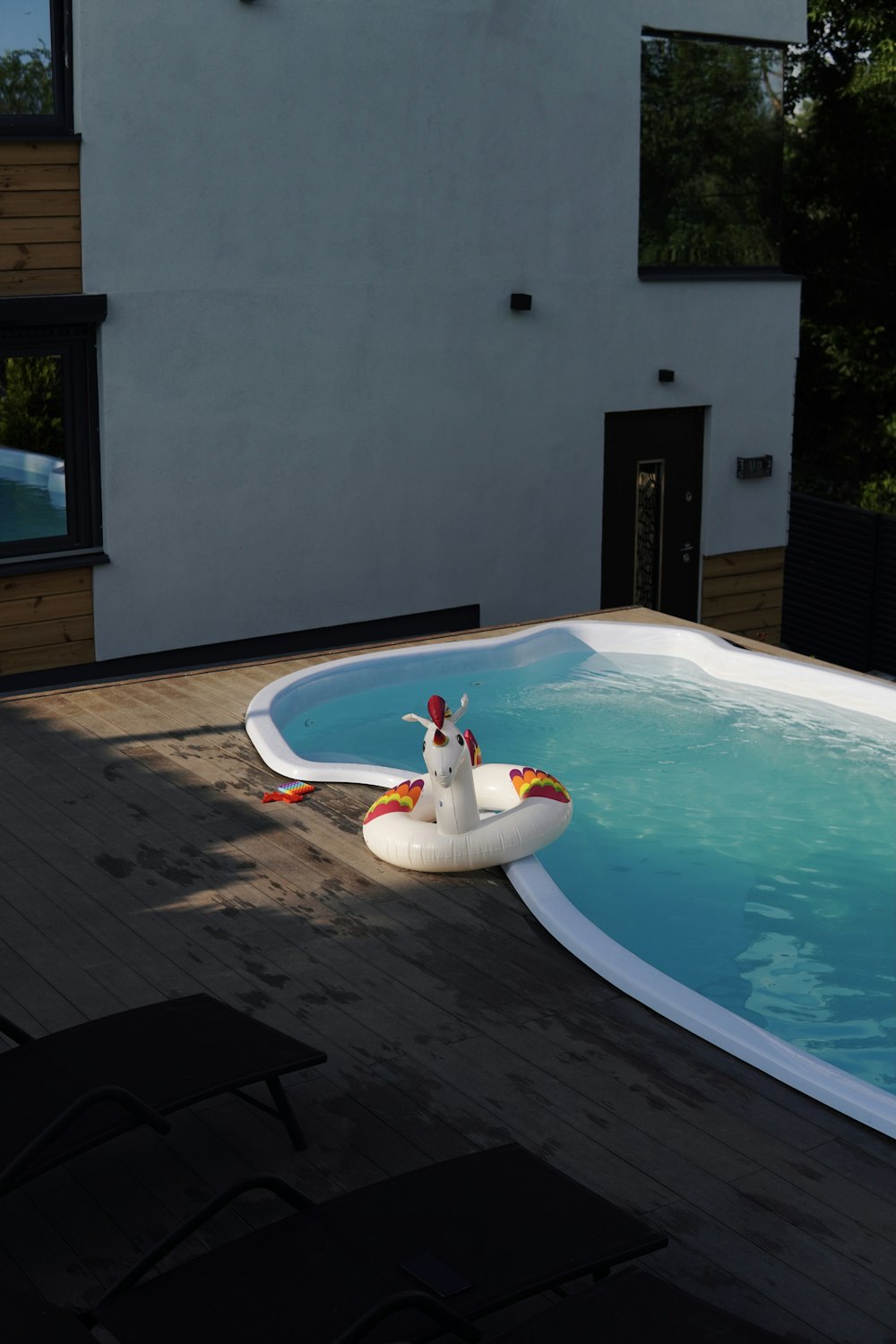 white and blue swimming pool