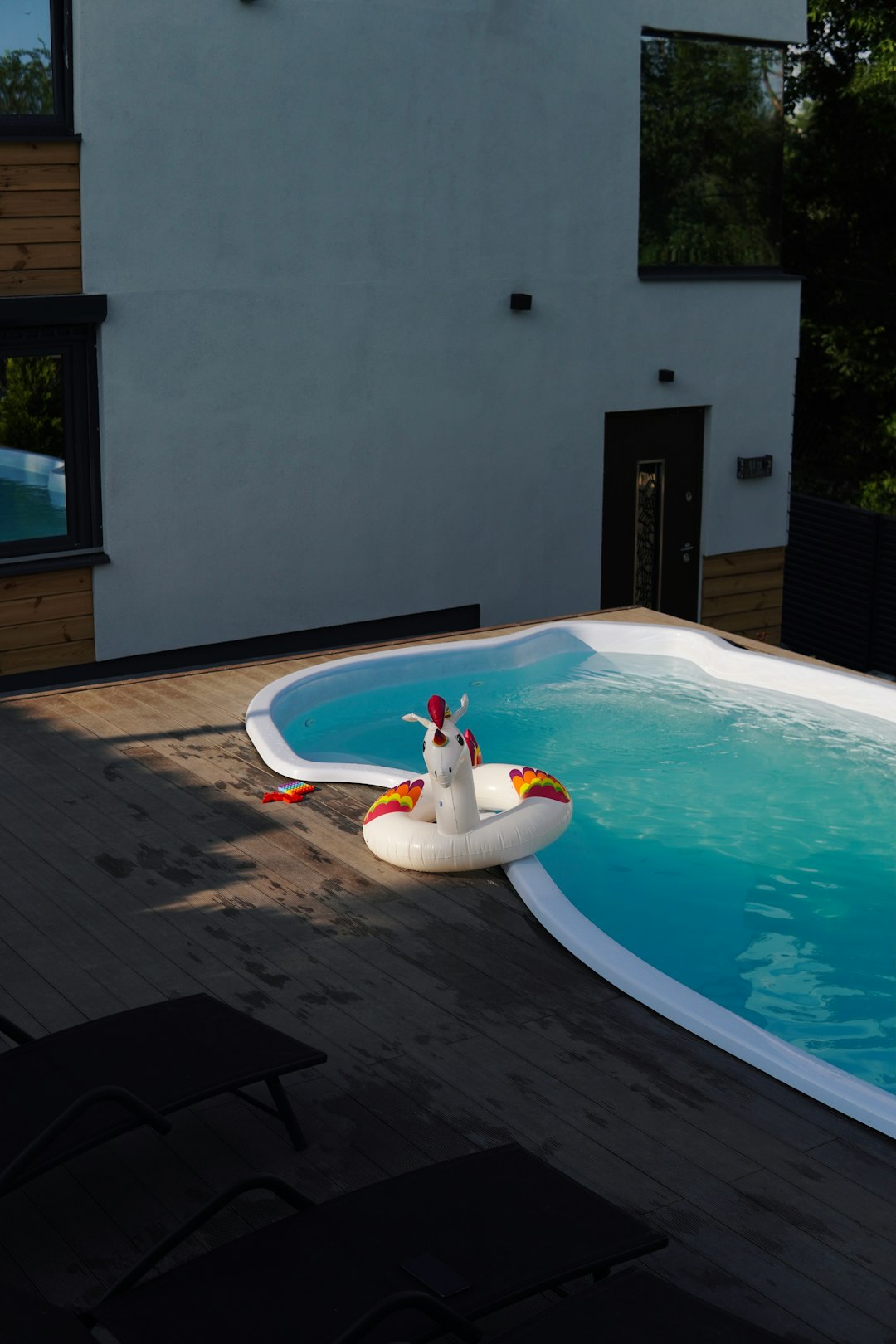 white and blue swimming pool