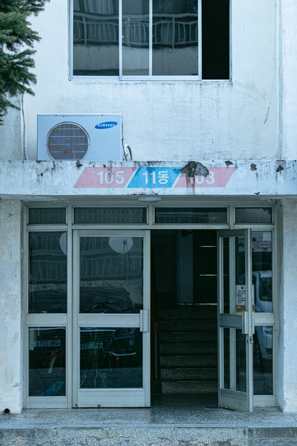 white and blue store front during daytime